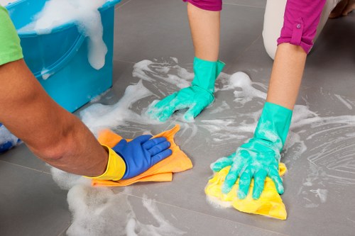 Domestic cleaner working in a Lambeth home kitchen